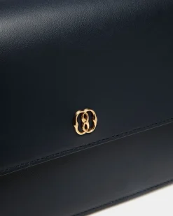 Emblem Small Crossbody Bag in Navy Blue Leather