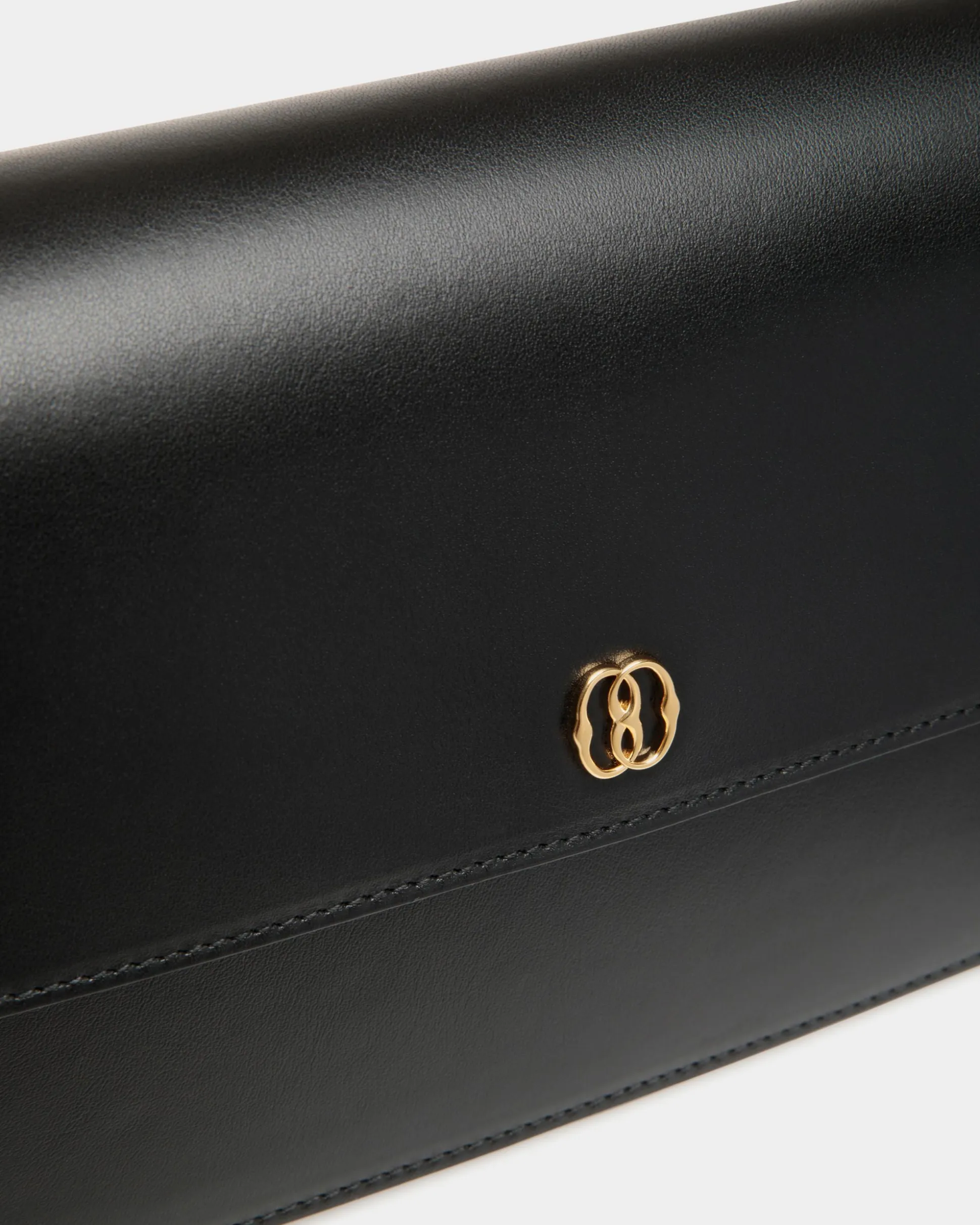 Emblem Small Crossbody Bag In Black Leather