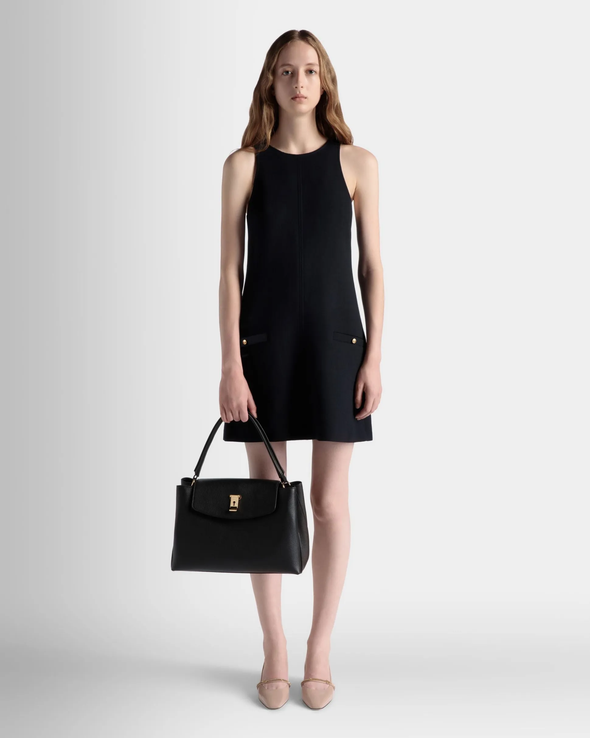 Lock Me Top Handle Bag In Black Grained Leather